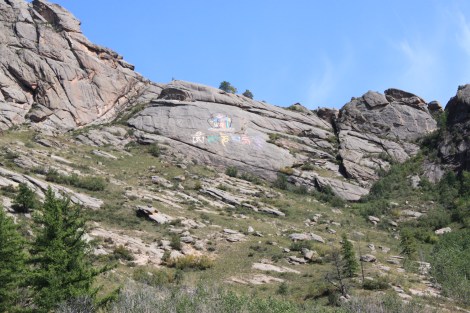 "Om Mani Padme Hum" painted on the hill