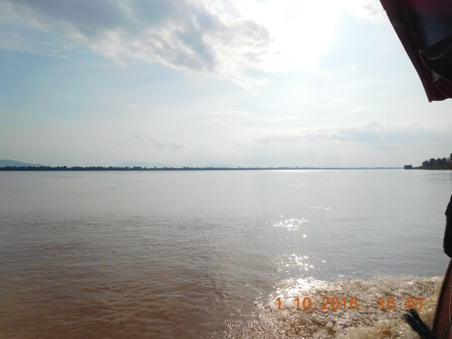 The sunlight sparking off the river