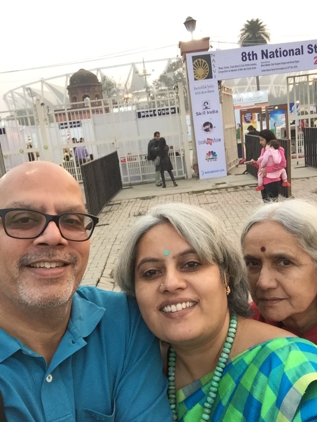 Three very happy people after eating "good" food. 